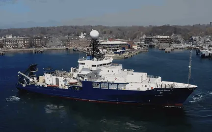 A WHOI research vessel at the Woods Hole dock
